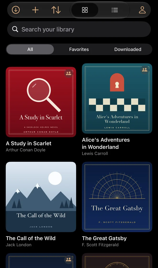 The Audiobooks app on iPhone: the library, with family-shared books marked