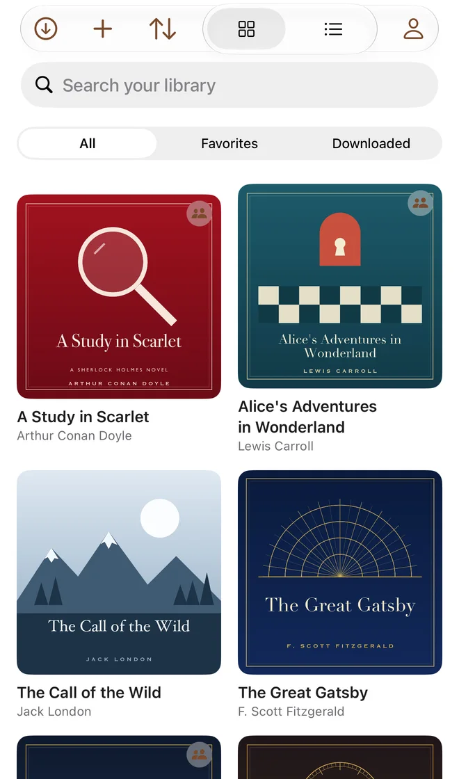 The Audiobooks app on iPhone: the library, with family-shared books marked